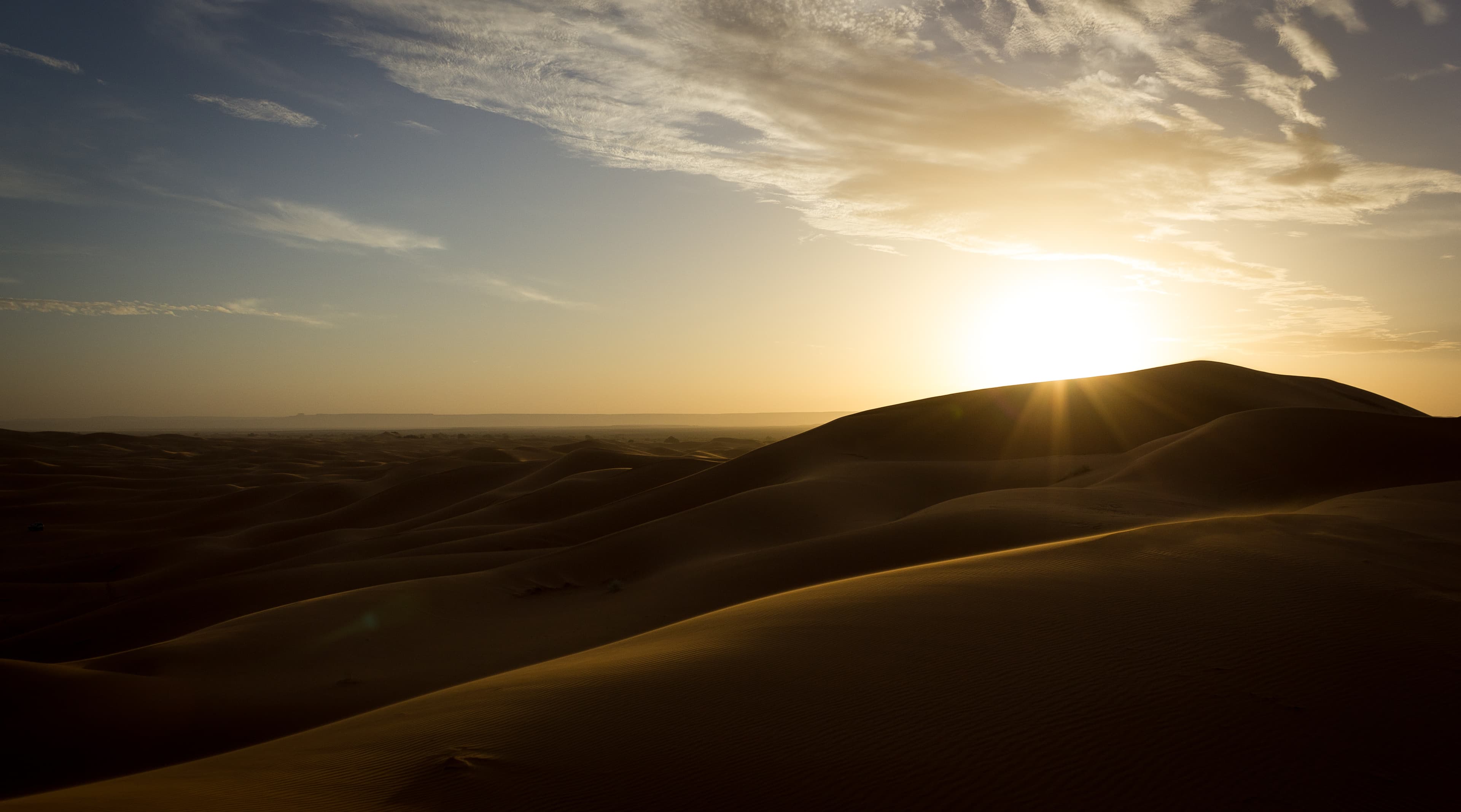 Sunrise over the Sahara dunes in Merzouga, Morocco